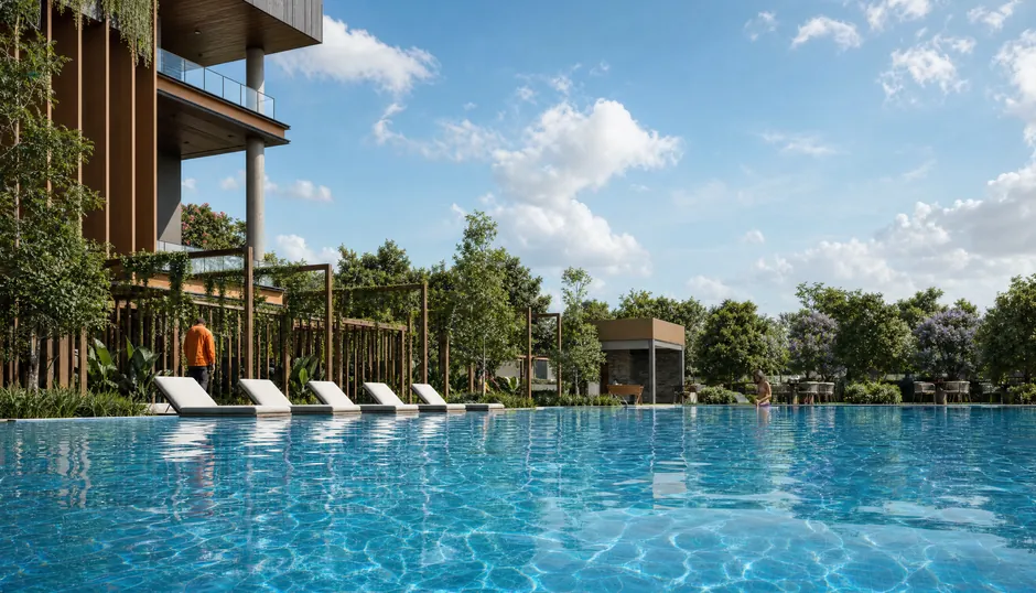 The swimming pool at Godrej Parkshire, edged by decking and planting