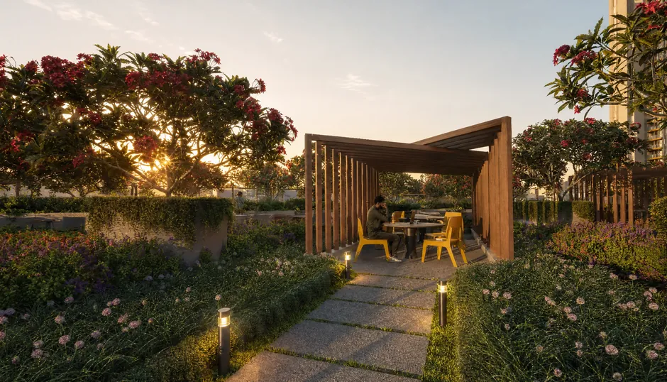 An outdoor work pod at Godrej Parkshire, with seating set under a shaded frame